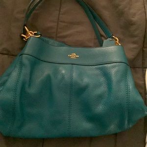Teal Coach purse. Great condition.